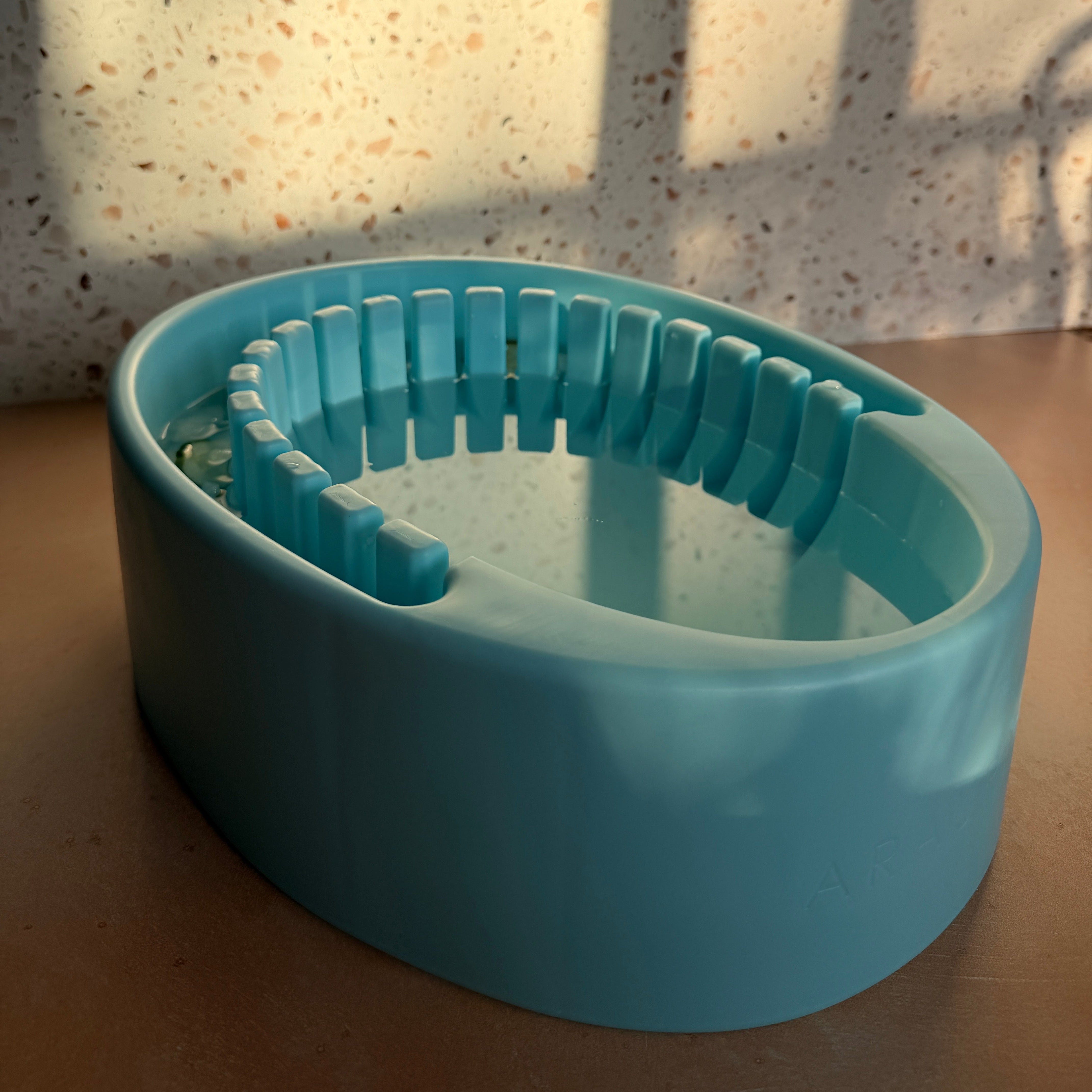 Face plunge bowl for ice facial submersion with cucumber